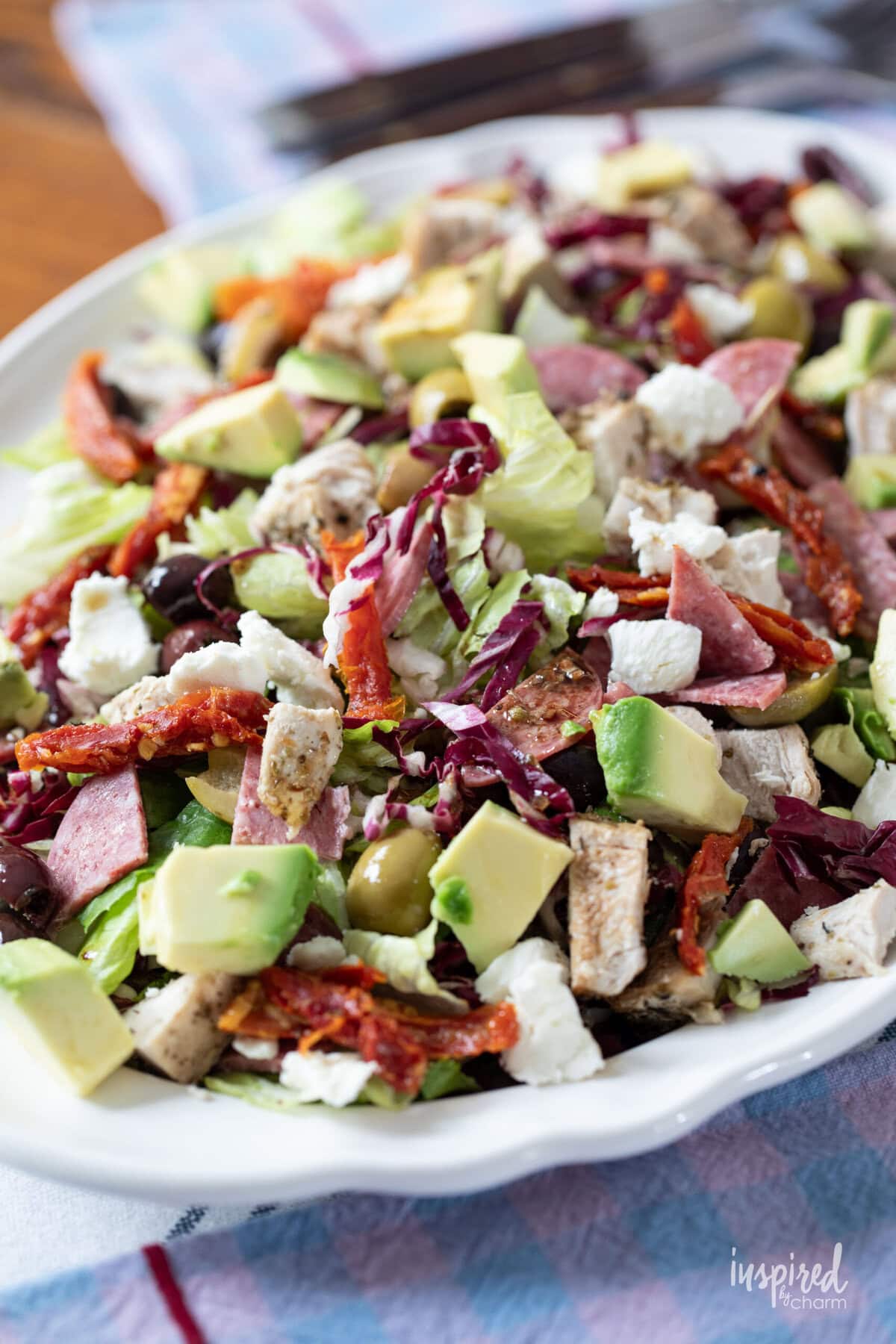 platter filled with antipasto romaine salad.